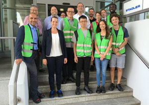 Enthusiastic participants of the Stadler Rail factory tour
