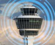 A modern airport control tower is overlaid with blue concentric circular patterns against a cloudy sky.
